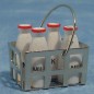 ZZ CESTA METALICA CON BOTELLAS DE LECHE